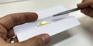 color comparison between two yellow diamonds
